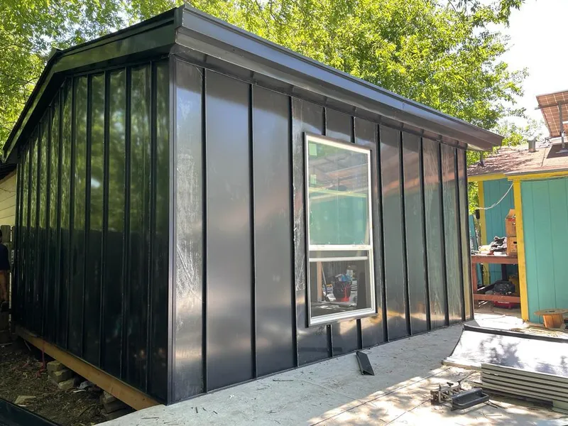 Black standing seam metal wall panels for Roof Inspection in PiÃ±on Hills