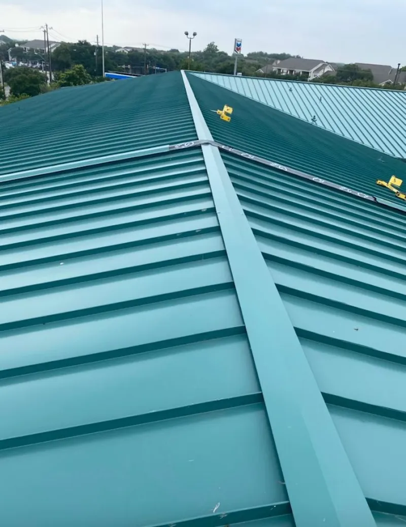 Green commercial metal roof ridge and valley for Metal Roof Repair in PiÃ±on Hills